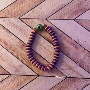 Handmade clay bead bracelet with a eye ball